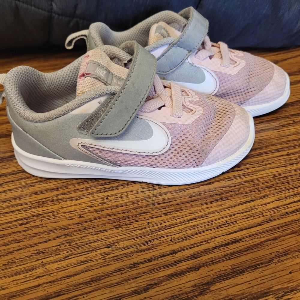 grey and pink Nike